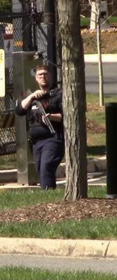 Please explain why one of your "security" guards cocked his weapon at a civilian on public property outside of your facility?