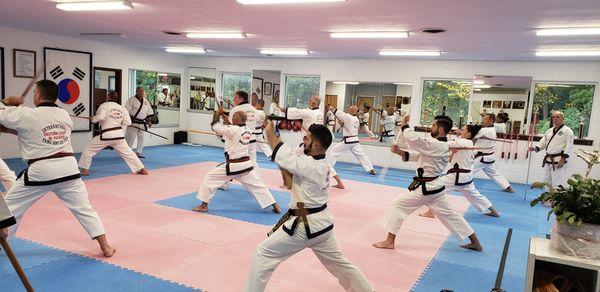 Training at headquarters with President and Founder of the I.T.F. Master Chun Sik Kim.