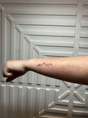 Fine line tattoo