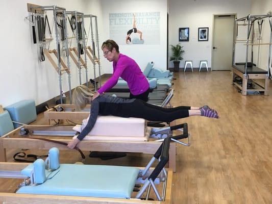 We spot to help our clients trigger the muscles that keep the neck safe & the back looking strong.