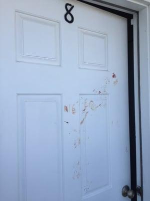 Blood on a friend's door