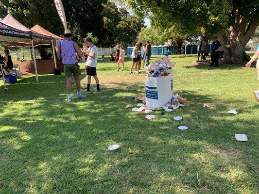 One of the many overflowing trash receptacles