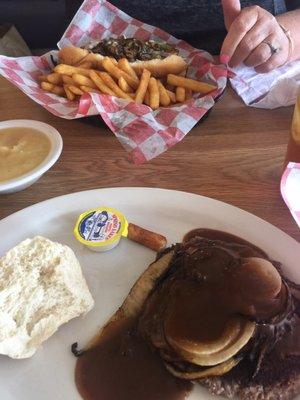 Philly and fried and Hamburger steak with gravy and onions.