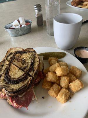 Ruben sandwich and tater tots and fries sauce. Yum Yum!