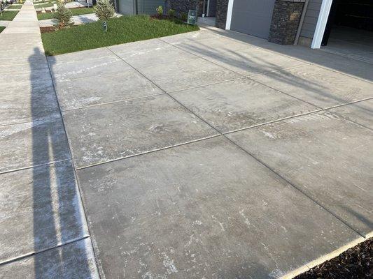 My House had a date with a Holt Home contractor driving on the wet curing cement for a pick up.