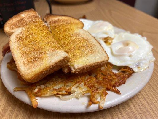 Eggs, bacon, toast, and hash browns for $7.50.