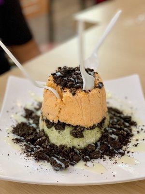 "Green Snow Thaiger" (I think) lol I know it's green tea/thai tea with Oreos and condensed milk!