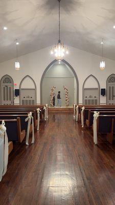 Us setting up the arch in the chapel