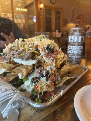Mile high Nachos with pork.
