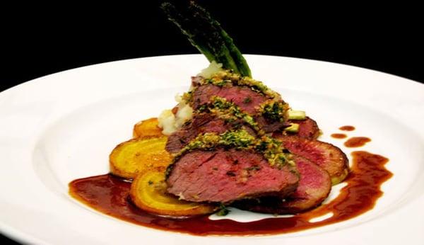 Herb Panko Crusted Steak with Sauteed Golden and Purple Beets and Asparagus, Truffle Whipped Potatoes and a Pomegranate Demi.