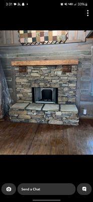 Wood burning fireplace, and stone work