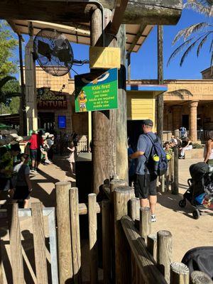 Sign that says one adult per tower.