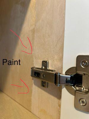 It was paint ins8de the cabinets. When I asked they said that they can tell me how to remove the paint. Why should I have to do it?