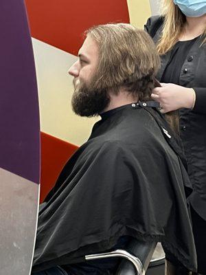 Cutting it off for donation.