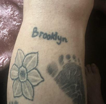 Misspelling of the name and then he went over it thicker to correct it he did not make any effort or offer to fix it