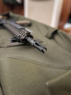 Pin and welded 4 prong muzzle device from surefire.