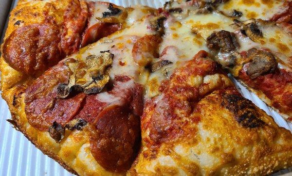 No cheese or toppings on much of the pizza.