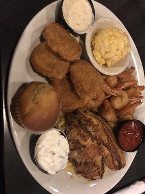 Shore platter: grilled tilapia, fried shrimp, mac and cheese, fried green tomatoes, and cornbread