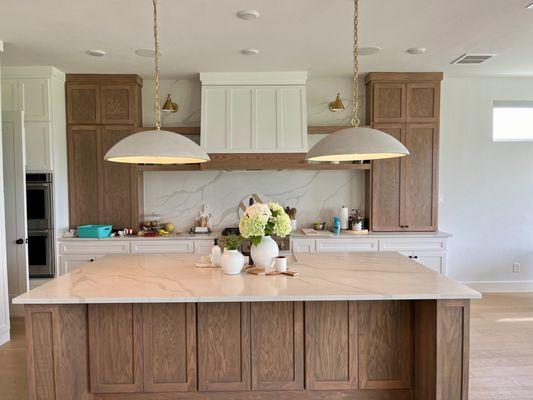 Concrete chandlers over kitchen island