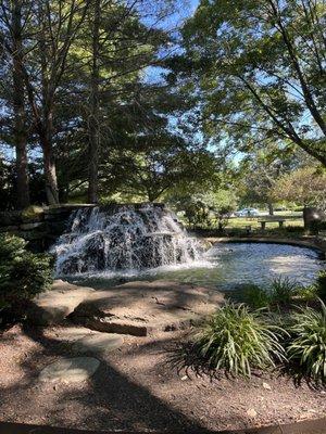 scenic waterfall feature with commemorative pavers