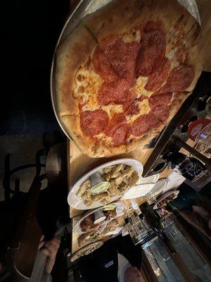 Pepperoni Pizza $17, fried pickles $8 wings $15