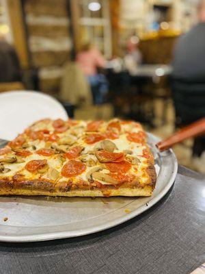 Sicilian pizza: extra cheese, pepperoni, mushroom