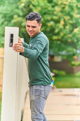 A vinyl fence installed in a St. Louis County yard.