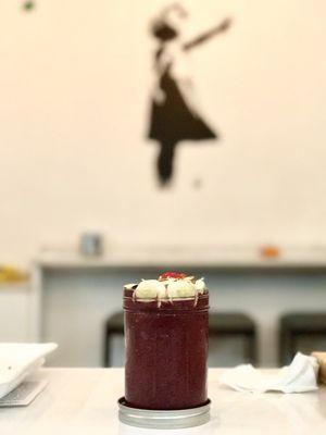 Acai bowl with bananas, strawberries and blueberries