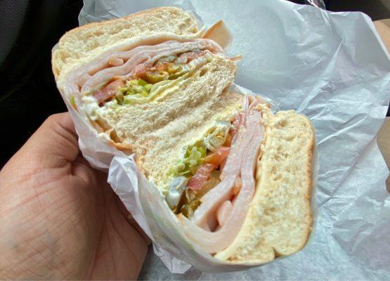Turkey, lettuce, tomato, mayo, mustard and jalapeños.