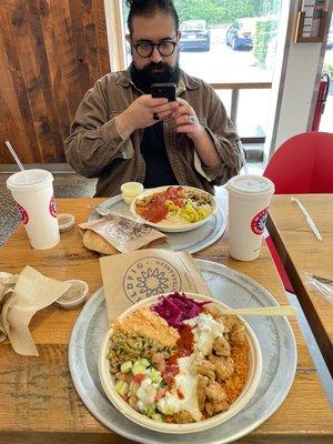 My dining buddy and I going at it with our custom bowls marveling at their fullness