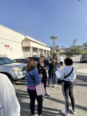 The line was all the way around the back of the building. This was 15 minutes before opening time.