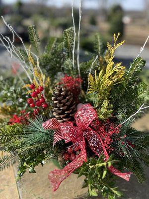Fun , locally sourced & foraged mixed evergreens & other foliage arranged in a container to display nature on your doorstep