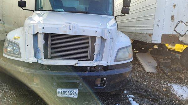 They broke the grille & just threw it in the back of the truck