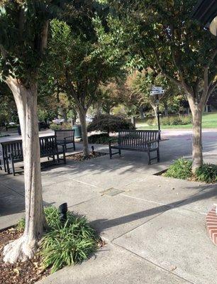 Enjoy some fresh air and sunshine in this conveniently located seating area right outside the library's front doors.