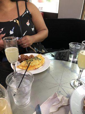 Omelette with bacon and waffles