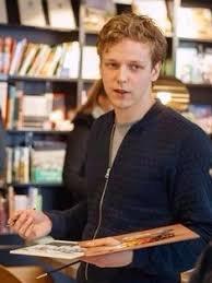 Artist Egbert Modderman of the Netherlands; His lifelike sacred paintings hang in the New Bern Art Exhibit; he is there through July 2018.