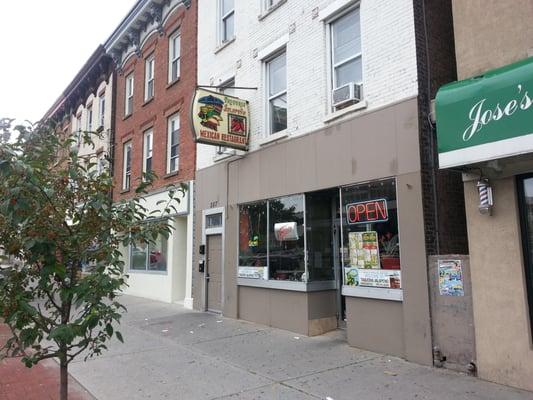 Front of Taqueria opposite old Broadway school