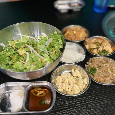 Sides, salad, dipping sauce, and salt seasoning