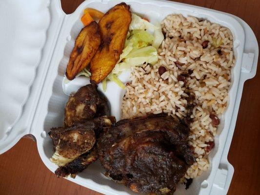 Jerk Chicken w/ rice and peas, cabbage and plantains
