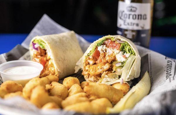 One of our many delicious refreshing wraps! With a side of cheese curds!