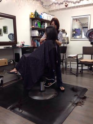 Rosa getting a haircut from Tracey Hirano!