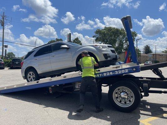 Car being out on tow truck by Lucas.