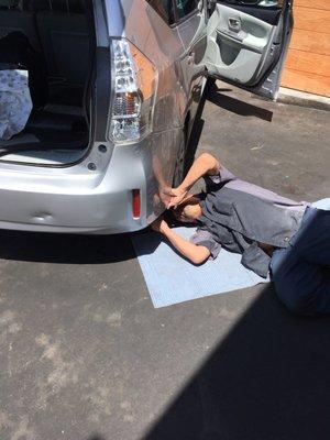 Miguel fixing the bumper