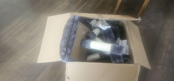 Random cat tree parts that aren't even half of what was supposed to be in the box. No hardware either.