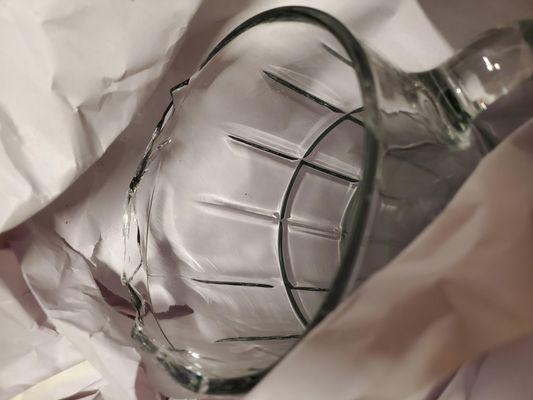 They packed glass in single sheet paper.