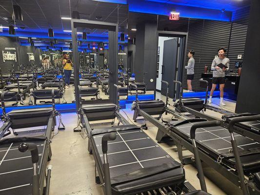 The studio has two rows of carriages and the lights come all the way down during class.