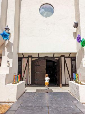 The path walking into the doors of the party castle