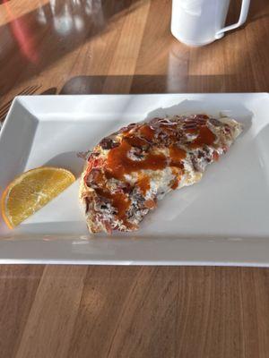 Egg white omelette with sausage, bacon and tomatoes. Delicious!