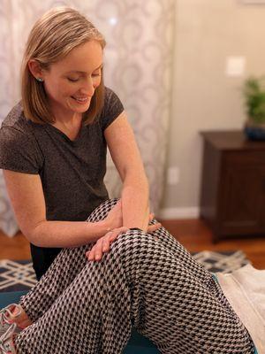 Dr. Becky Parr working with a client in her home.