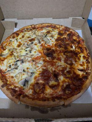 Half mushroom half pepperoni large pizza.